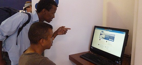 people looking at a website