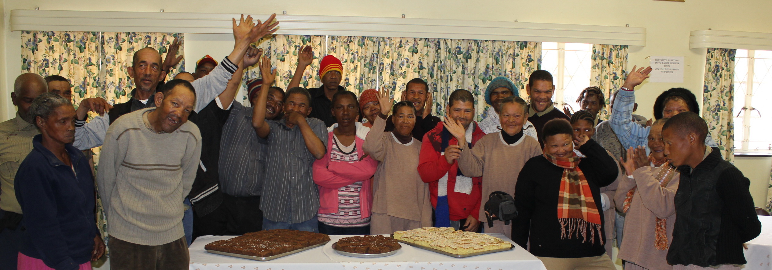 A group of mental health patients enjoyed some cake as part of the celebrations.