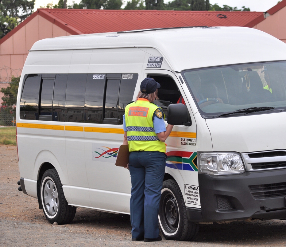 A traffic officer inspects a minibus taxi in Worcester this week.