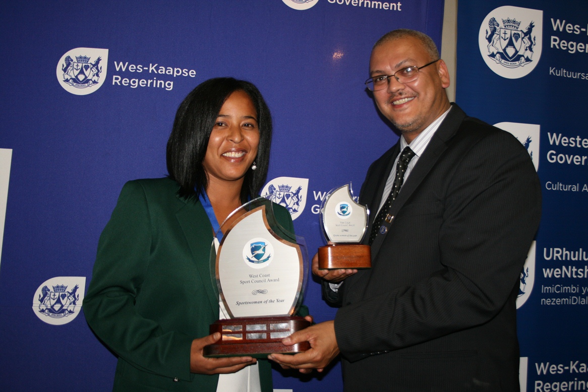 Audrey Lawrence (West Coast Sportswoman of the Year) and Adv. Lyndon Bouah (Department of Cultural Affairs and Sport).