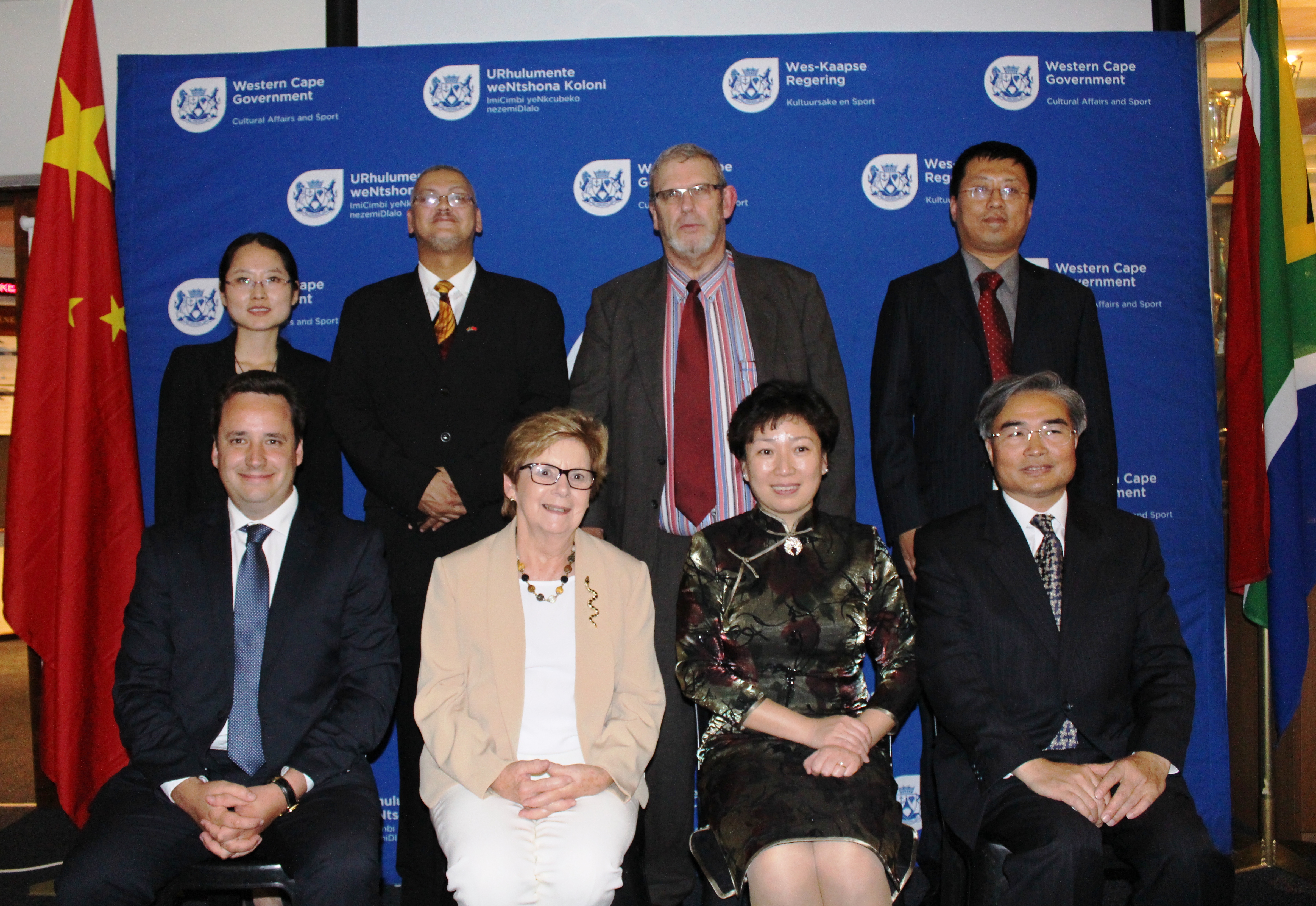 Back left: Li Xiao, Adv. Lyndon Bouah, Adv. Brent Gerber, Zhang Yong  Front: Gareth Bloor, Belinda Walker, Luan Xin (Vice Mayor of Qingdao) and Lian Shugen (Consul General of China).