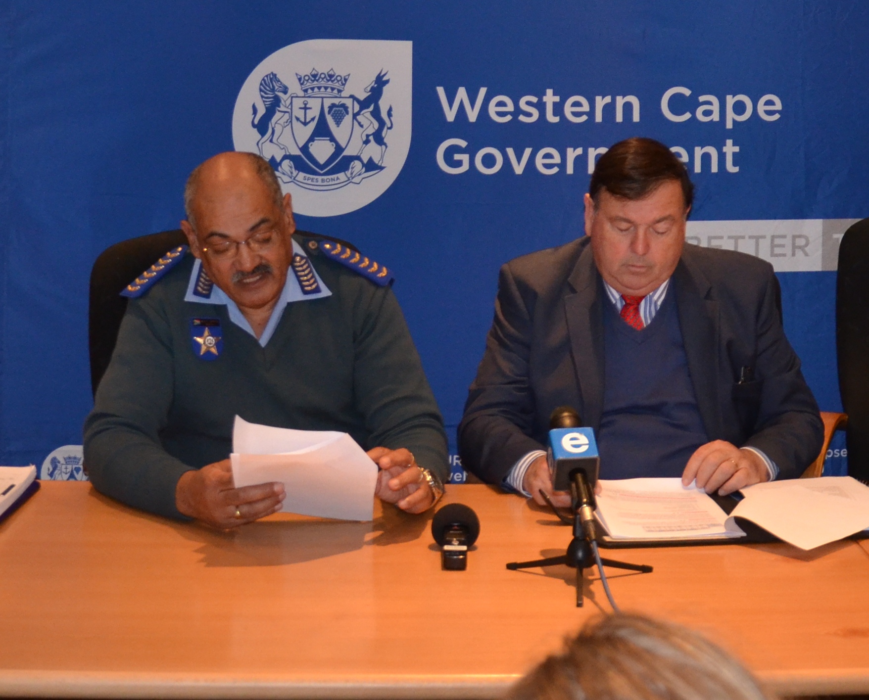Traffic Chief Kenny Africa and Minister Donald Grant at the media briefing.