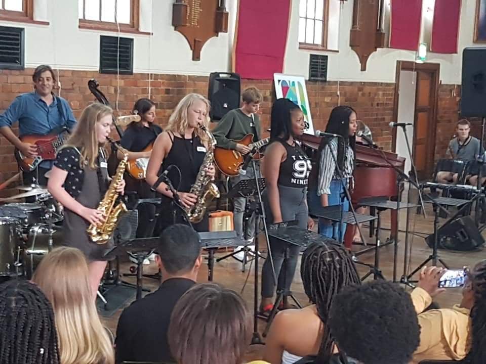 Minister Anroux Marais with articipating students at the Youth in Music Excellence Initiative hosted by the Cape Town Music Academy (CTMA) as part of the Toyota US Woordfees