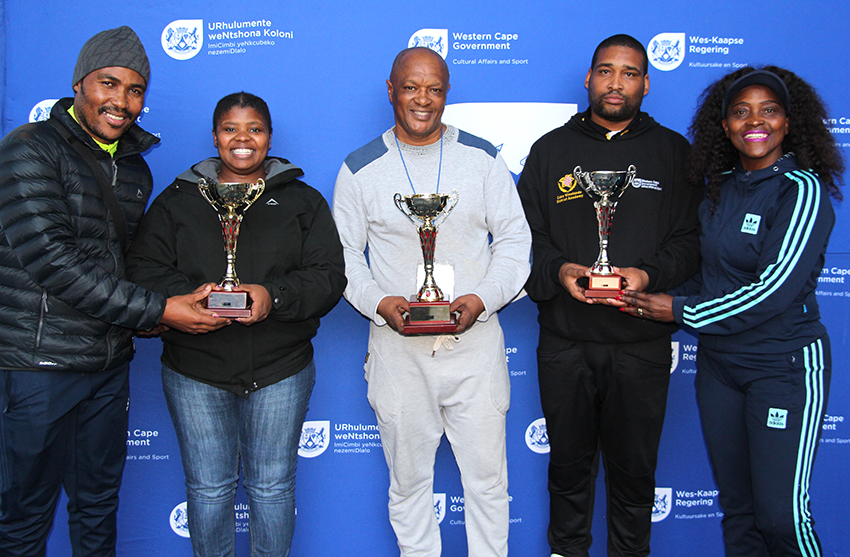 DCAS Deputy Director Philasande Macwili and Rosie Makhumalo, Kgati Western Cape Chairperson with the overall regional winners of the games