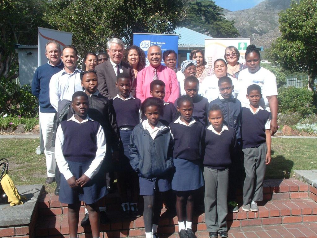 Deputy Minister Cronin with officials from Public Works, DCAS, Hout Bay Museum and learners from two local schools.