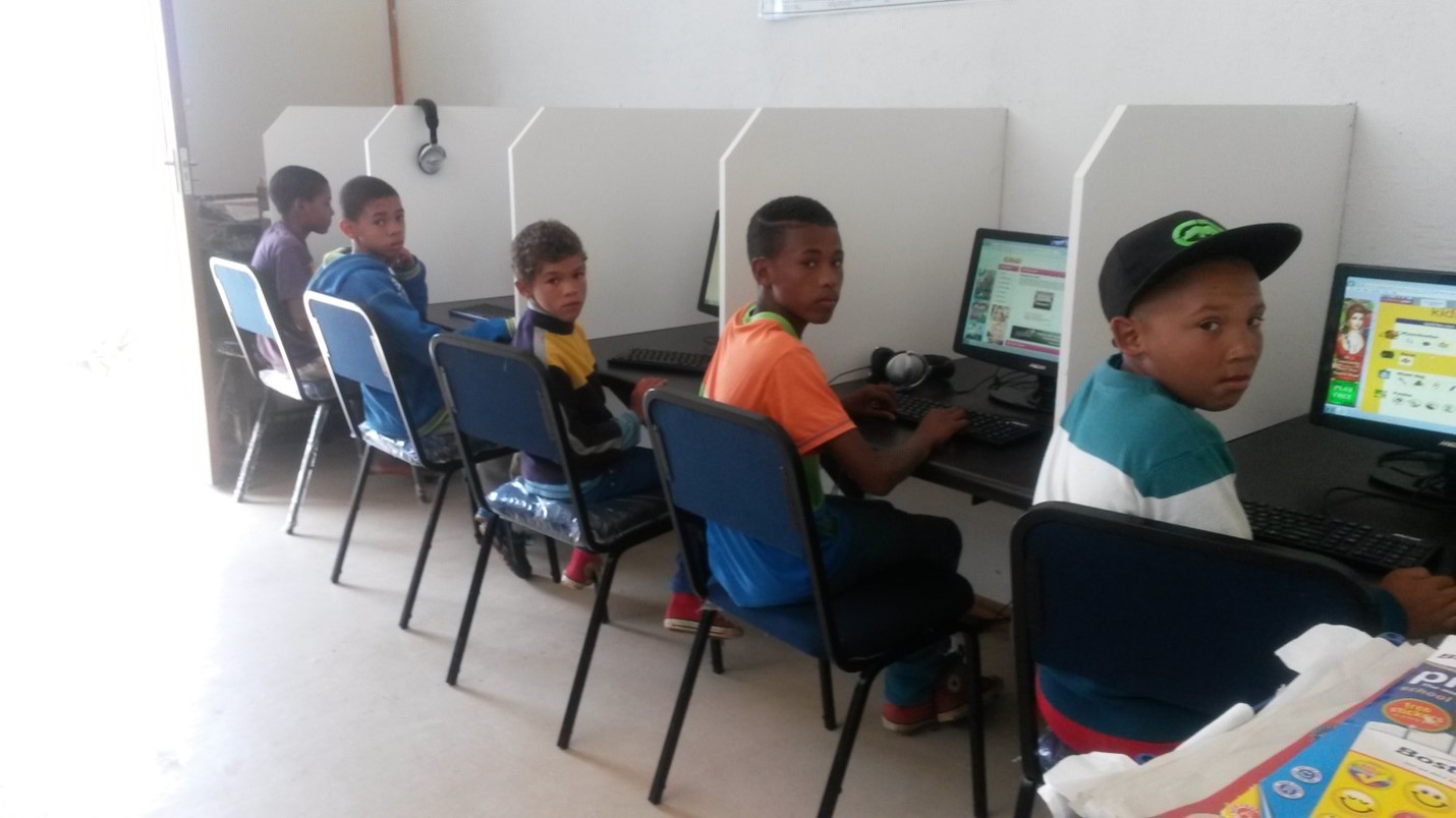 Kids making use of the services in the Doringbaai eCentre