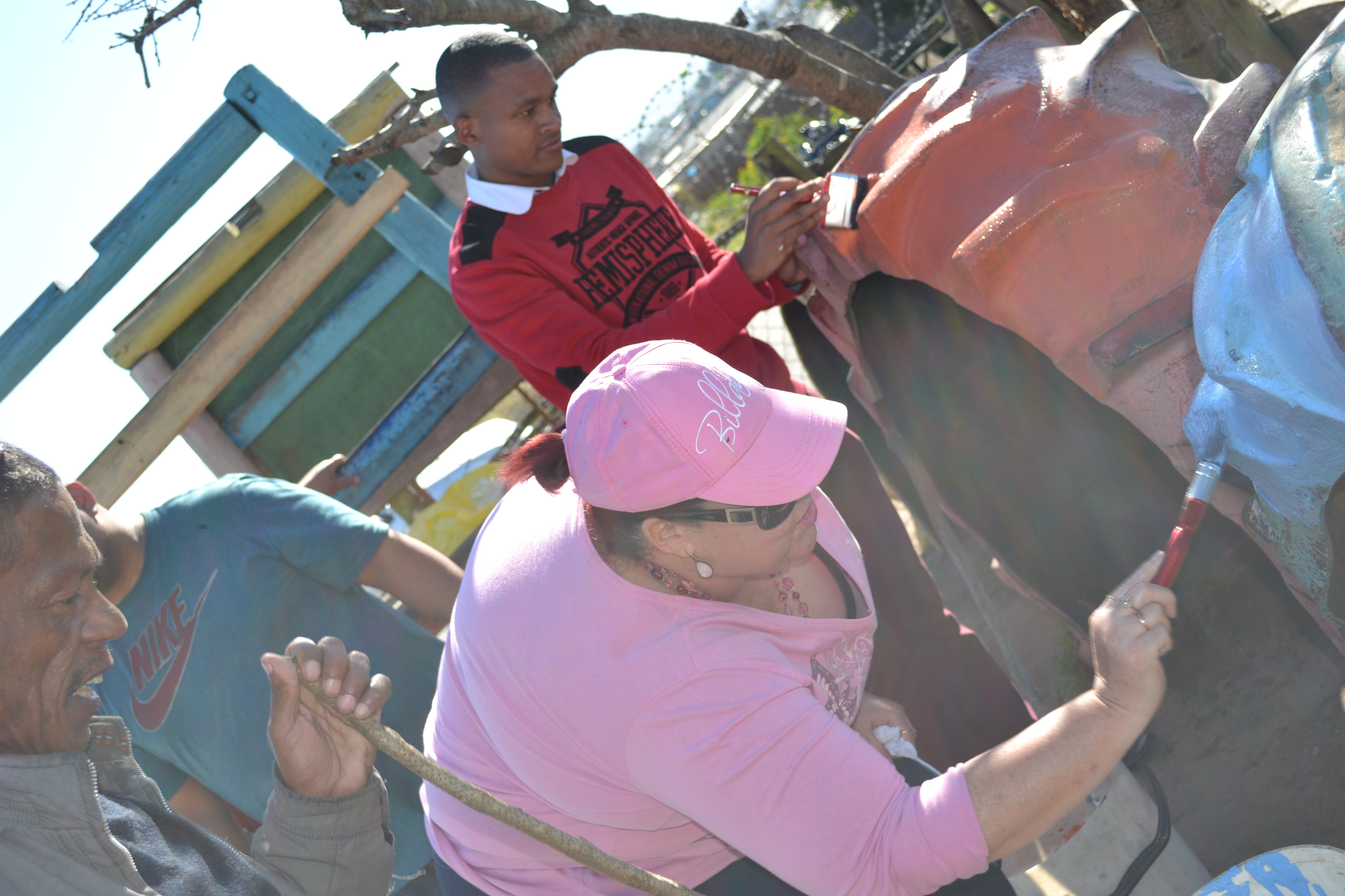 Eden Karoo Officials painting the play area of the Centre