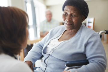 Elderly woman in wheel chair