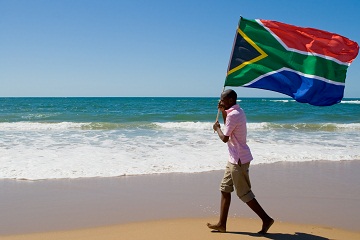 freedom-day-man-walking-with-flag