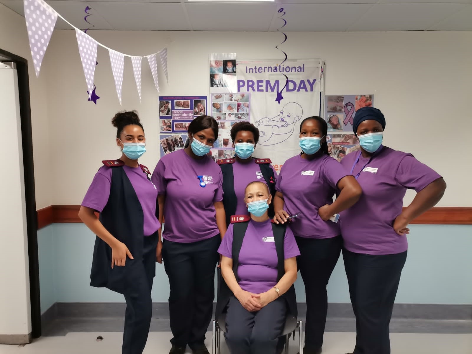 Happy staff working in the purple-coloured neonatal wards at Tygerberg Hospital.