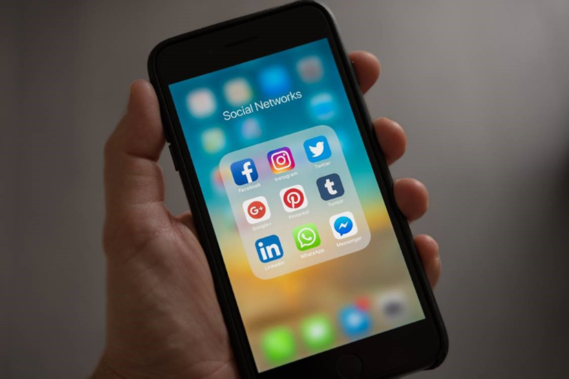 Smartphone with social media app logos