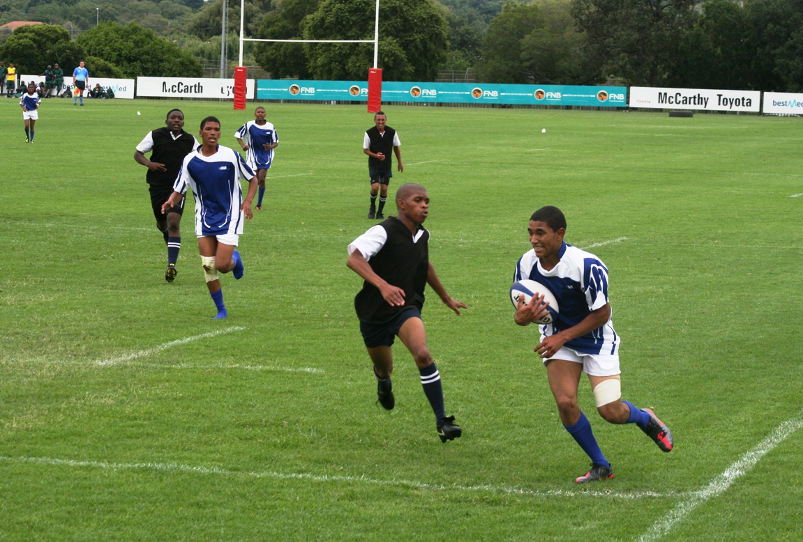 Davern Cloete of Weston High School (Vredenburg, Western Cape) on his way to scoring in an u16 sevens rugby match against Queens High School (Gauteng). Weston won the game 19–17.