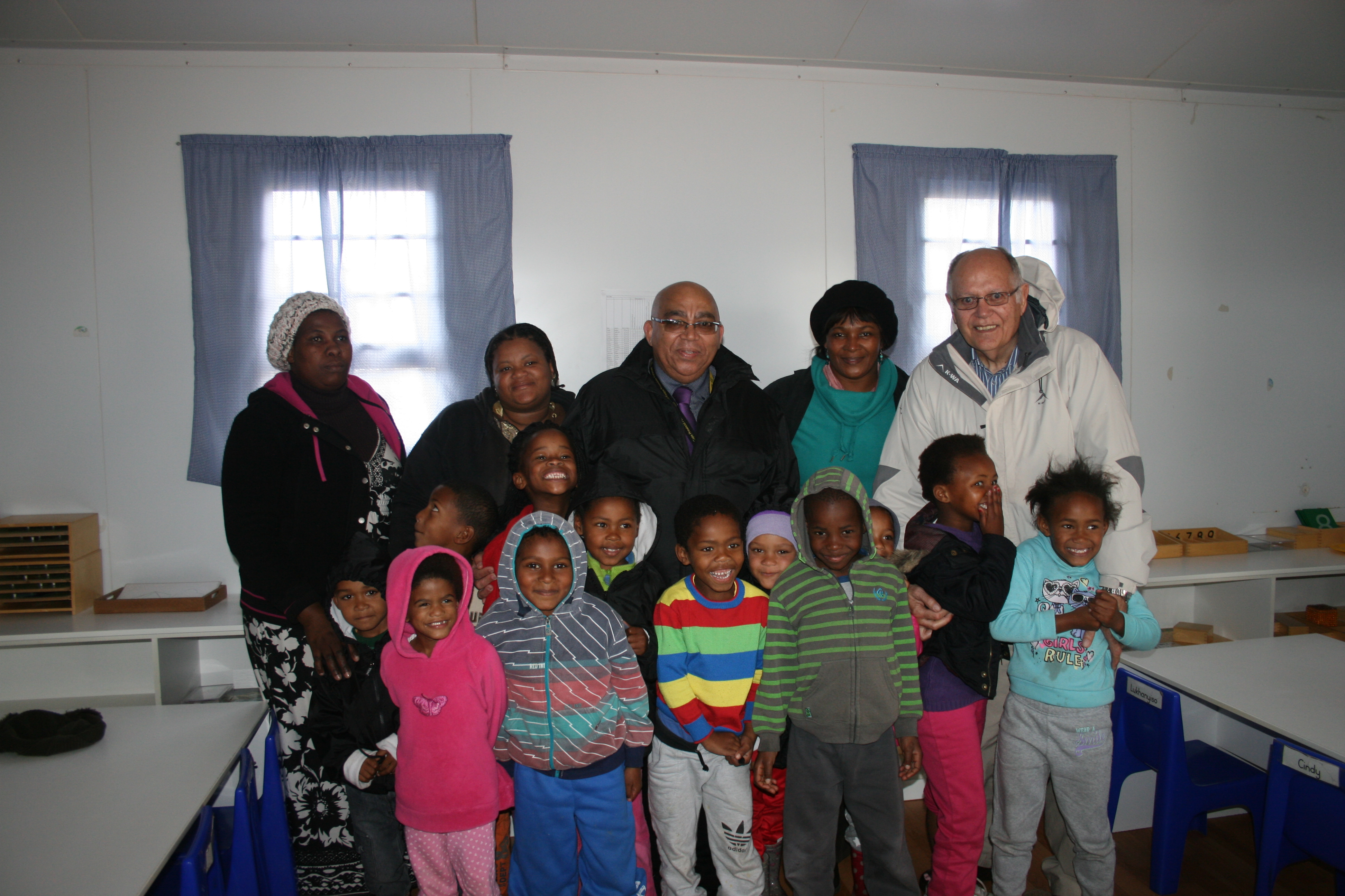 MEC Fritz pictured with staff and learners of Klippie Kids Early Childhood Development Centre 