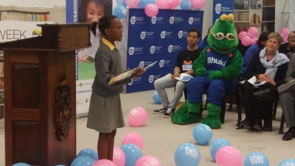 Learner from Masiphatisane Primary School delivers a reading presentation