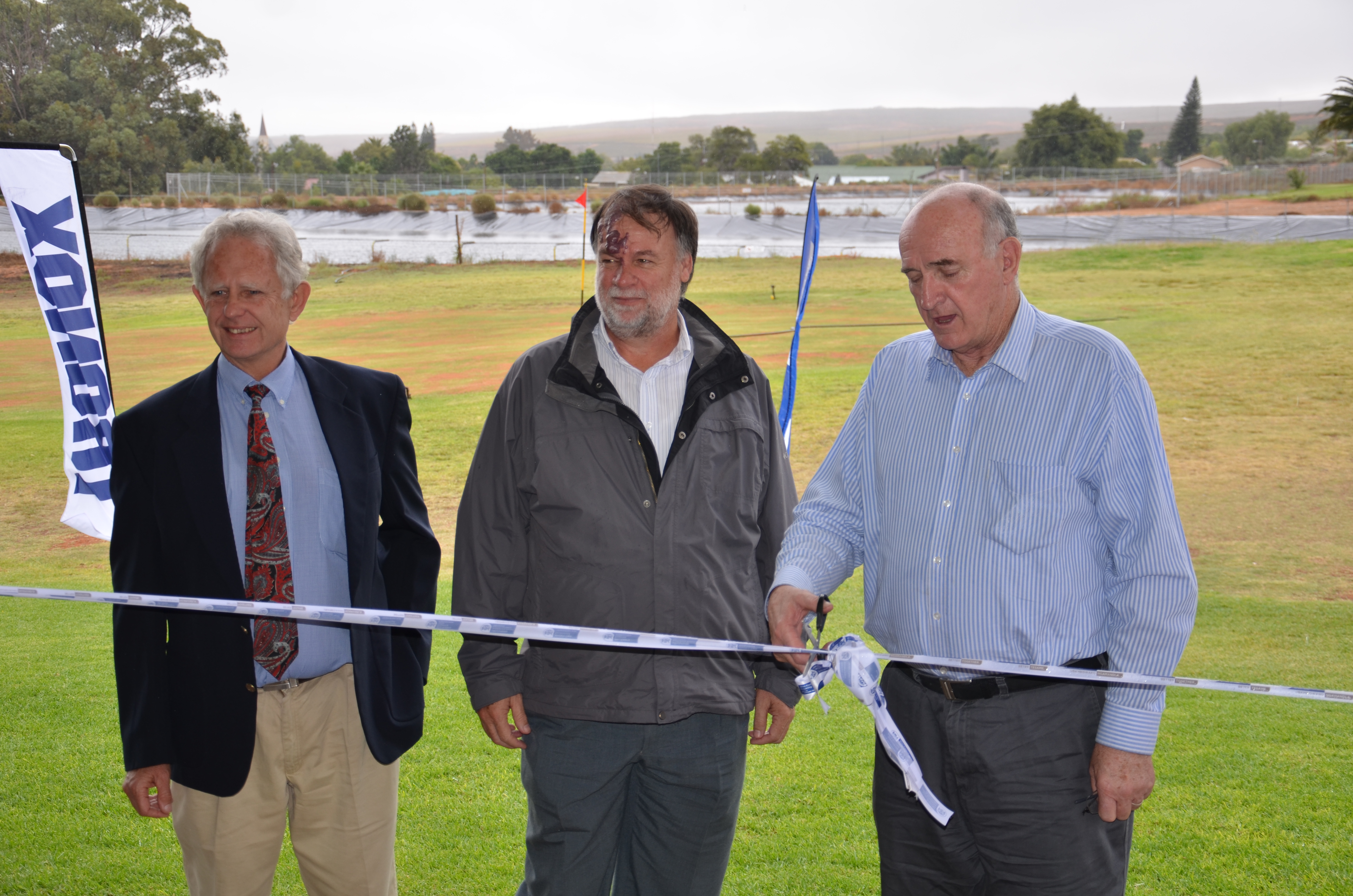 Lars Starke:Department of Transport and Public Works, David Southy:Tronox and Minister Robin Carlisle cut the ribbon.