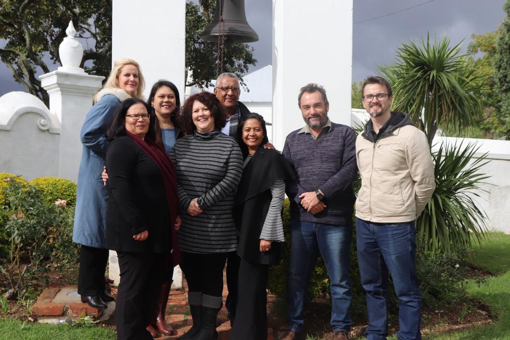 Michael Janse van Rensburg and the managers of the various museums in the Cape Winelands at the historic bell of the Oude Kerk Volksmuseum in Tulbagh