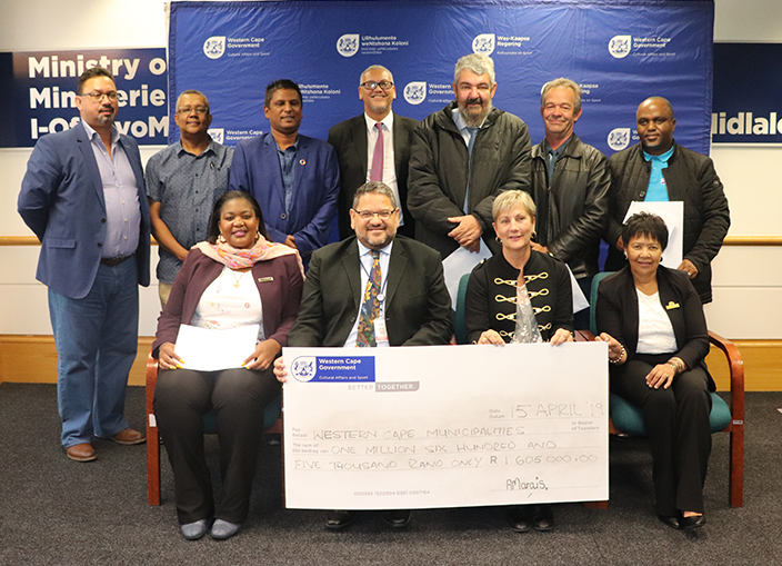 Minister Anroux Marais and DCAS HOD Brent Walters with relevant Mayors at the cheque handover
