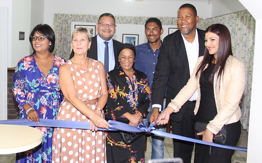 Minister Anroux Marais, chief Mandla Mandela and his wife Nosekeni Rabia Mandela officially open the exhibit, in the kitchen of the Nelson Mandela House at Drakenstein Correctional Centre