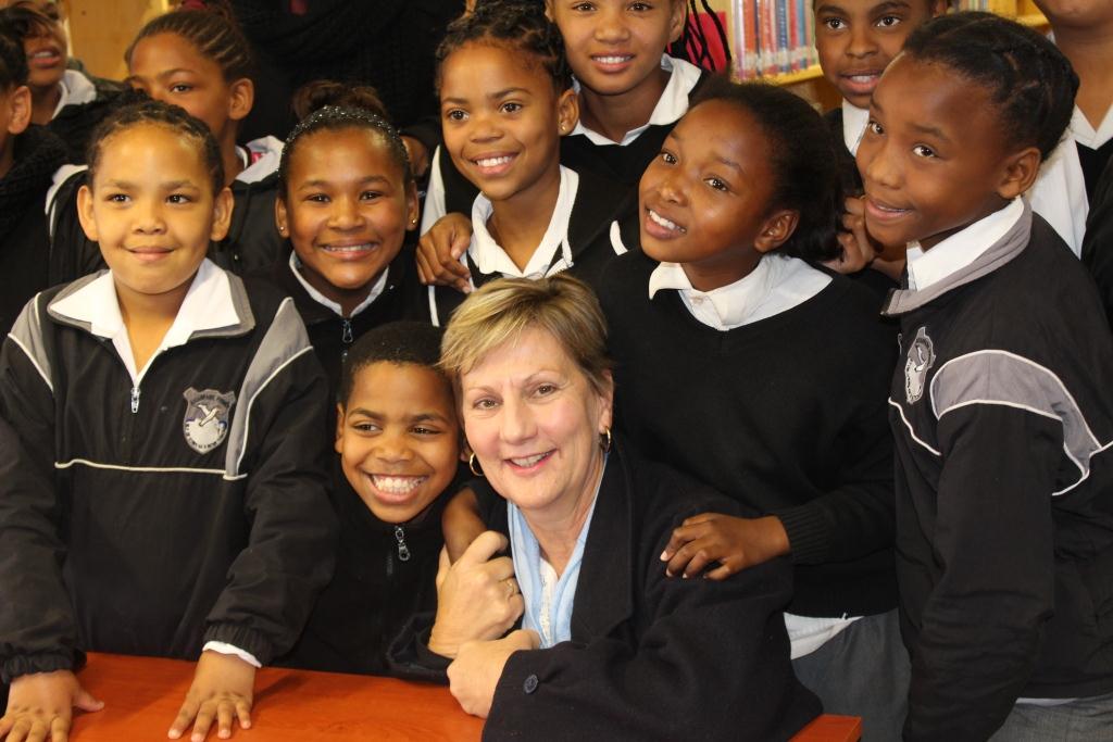 Minister Anroux Marais with learners from Avian Park Primary School