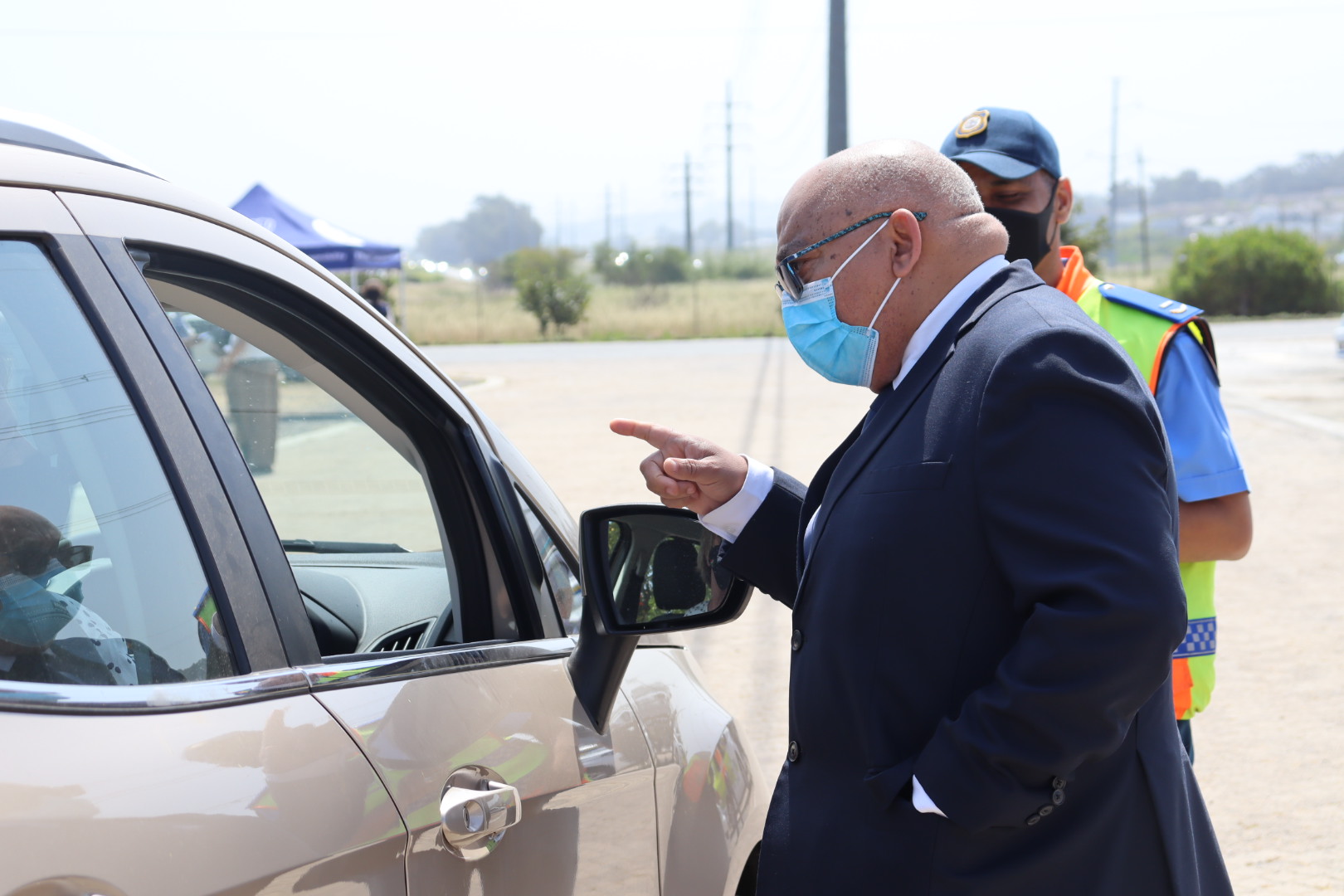 Minister Fritz interacting with motorists