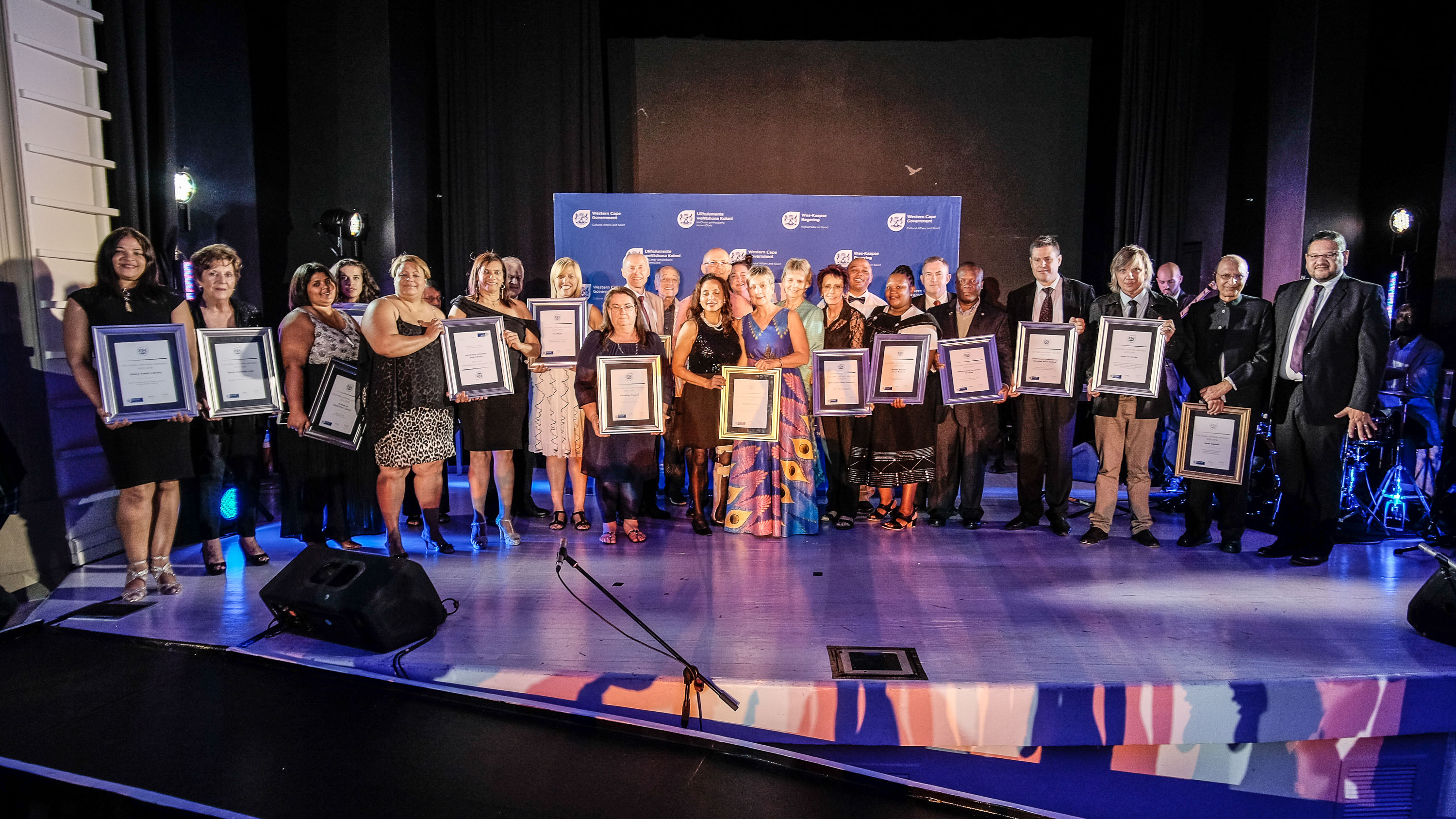 Minister Anroux Marais and HOD Brent Walters with some of the winners of the Cultural Affairs Awards 2017/18