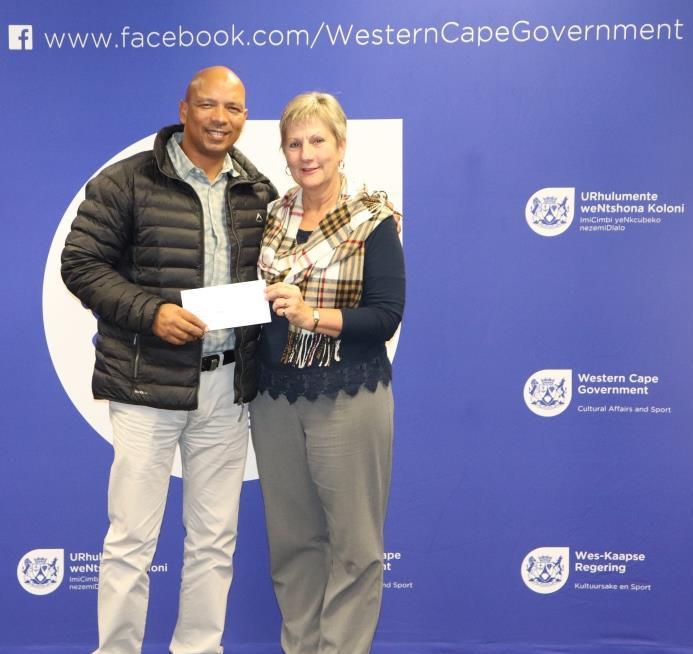 Minister Anroux Marais hands over sport funding to Edwin Marthinus of Theewaterskloof Municipality