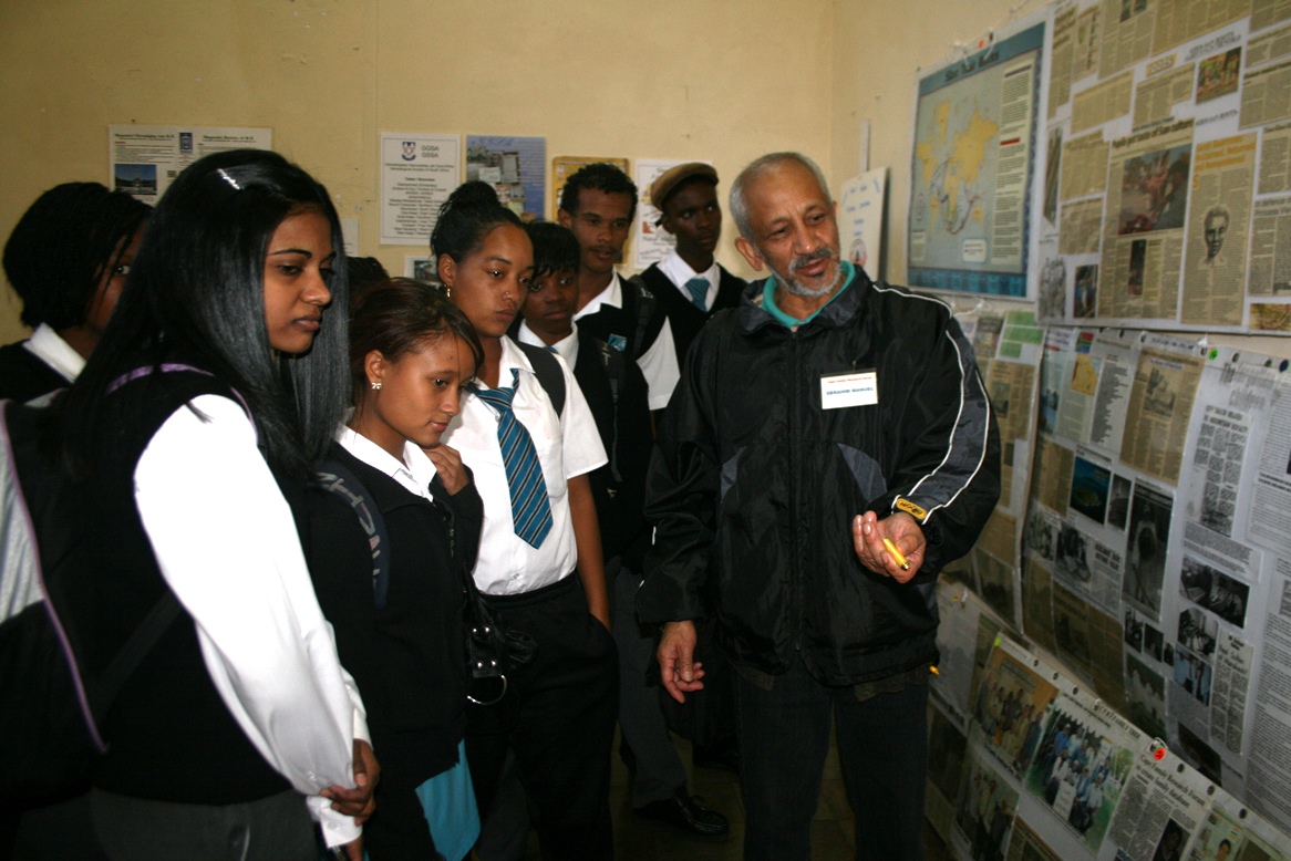 Mr Ebrahim Manuel with learners at the exhibition on research methods and archival resources.