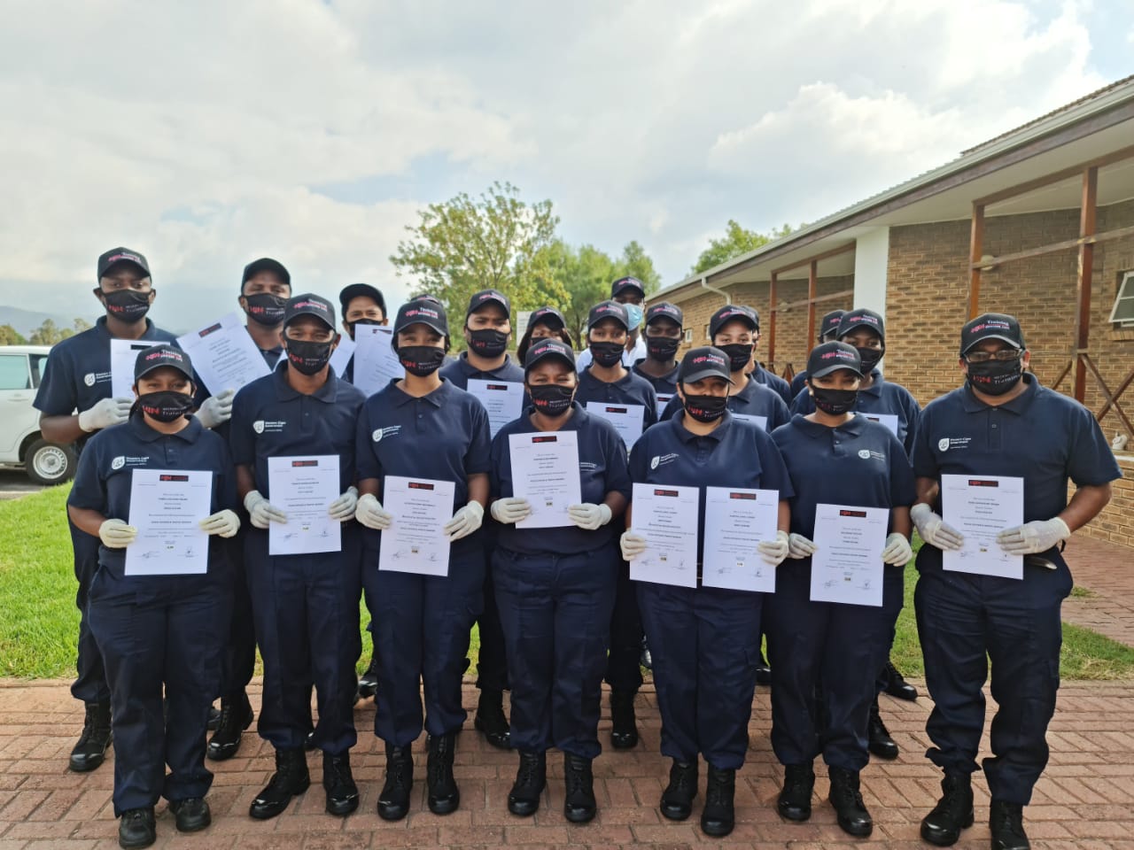 new_recruits_standing_proudly_with_their_certificates_robertson.jpeg