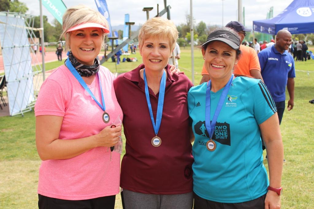 Participants showing off their medals after the Trail Walk
