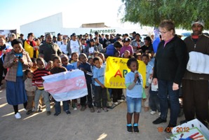One of the children at the Pikanania creche performing the national anthem.
