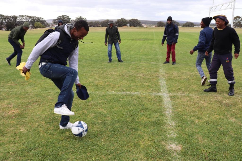 Soccer players warm up before competing at the Overberg BTG