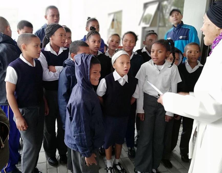Song performance by Tesselaarsdal Primary School learners at the official opening of the library