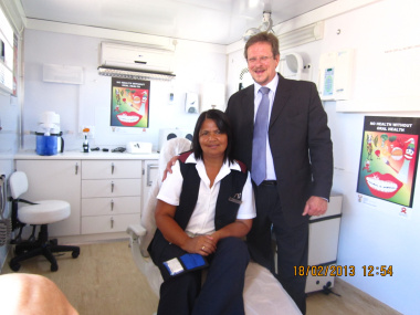 Western Cape Minister of Health, Theuns Botha, with Sister Loretta Roelfse in the NHI Oral Mobile Unit at the launch of the NHI pilot in Eden earlier this year.