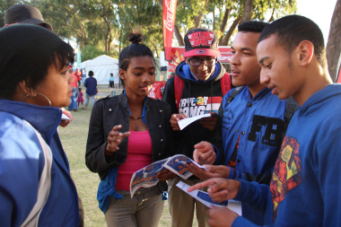 A group of learners interact with Tracey-Lee Thomas of the DCAS MOD programme.