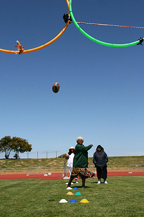 A participant takes part in the rugby throw