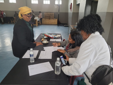 A resident signing up to become an emergency parent 