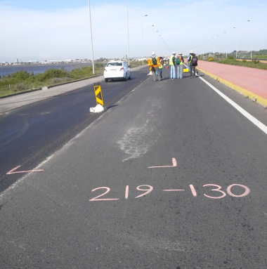A section along the southbound carriageway of the R27 being marked out for base patching due to the presence of 'crocodile cracks' on the road surface.