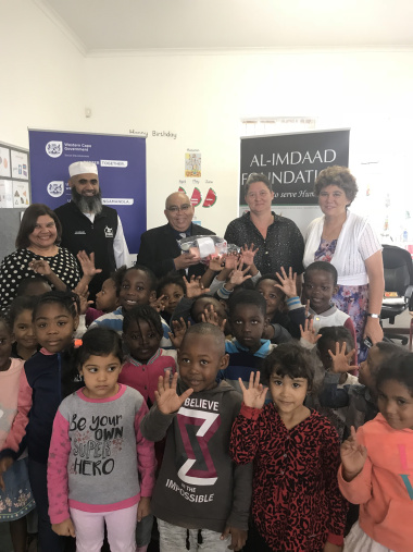 From left to right, Judy Philand (Principal), Yusuf Rajah (Al-Imdaad), MEC Fritz, Odette Tesner (ECD Teacher), and Rev. Cathleen Smith (ECD Chairperson)