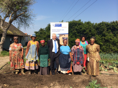 Minister Alan Winde with members of the Siyazama food garden.