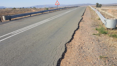 An example of where the road pavement structure has failed.