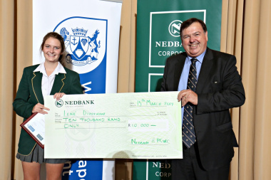 Minister of education Donald Grant and the winner of Nedbank busary competition Miss Lené Dippenaar from Tygerberg High School