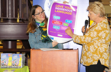 Cecilia Sani and Helga Fraser show a new poster promoting the use of indigenous languages.