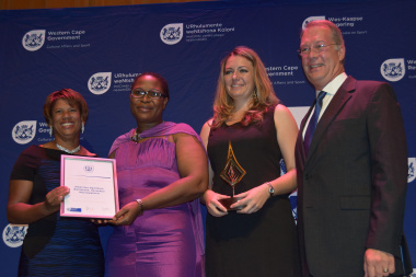 Representatives from the Albertina Public Library receiving an award for Best Small Public Library from Nomaza Dingayo