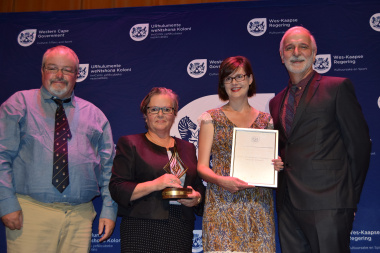 Claire Abrahamse, Tim Hart and Melanie Attwell receiving their award for Best Heritage Impact Assessment or Heritage Report