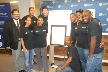 At the back are Head of Department Brent Walters, Rory Kleineveldt, Ernst van Dyk, Cedric Finch, Andrea Dondolo and Siv Ngesi. In front are Leandra Smeda, Dr Nomafrench Mbombo and Lungile Tsolekile.