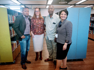 DCAS Director Library Service Cecilia Sani and DAC Provincial Coordinator David Lebelo with Library Service staff at the official opening of the Dunoon Library