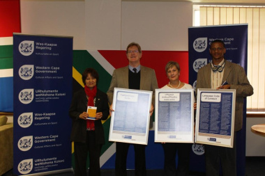 Deputy Chair of the Language Committee, Ria Olivier with Quintus van der Merwe, Minister Marais and Xolisa Tshongolo