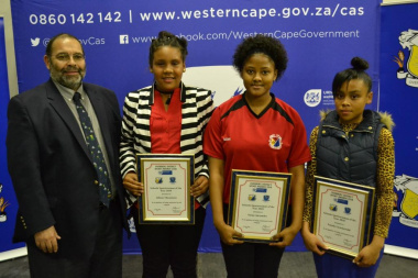 Director Paul Hendricks with the nominees for school sportswoman of the year at the Overberg Sports Awards