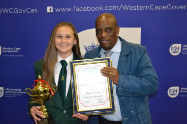 Director Thabo Tutu with junior sportswoman of the year winner Mignon van Zyl at the Overberg Sport Awards