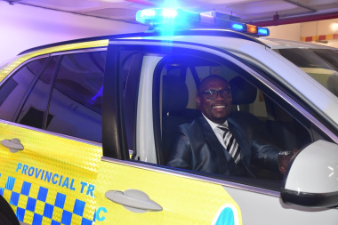 Minister Madikizela in a new highway patrol vehicle.